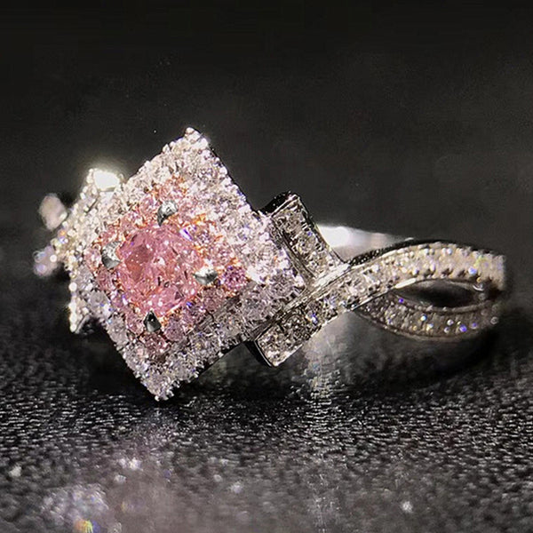 Cross-wound  Diamond Zircon Ring